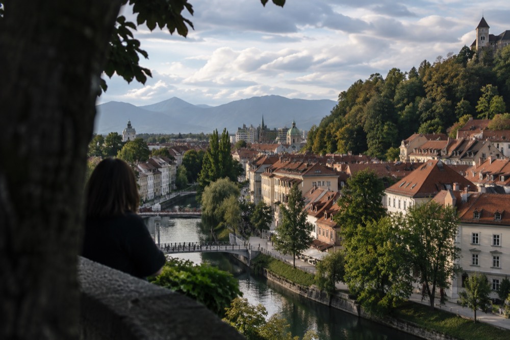 The Triple Bridge and the pastel facades of the old town along the Ljubljanica river