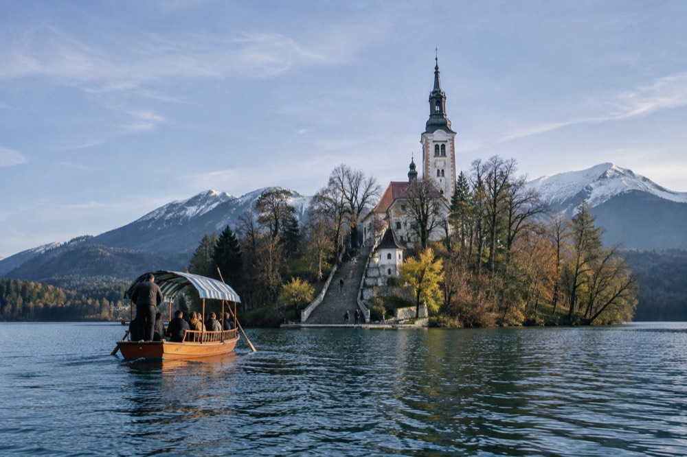 The pletna boat landing on Bled island with the church steps behind