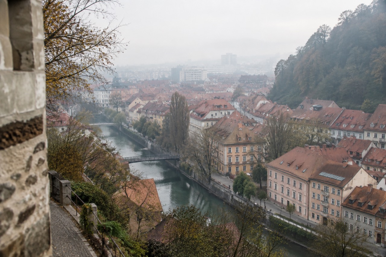 Ljubljana old town rooftops seen from the castle hill above the Ljubljanica river