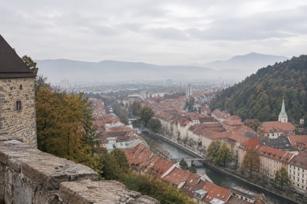 View over the river and rooftops from the castle ramparts, showing the compact centre laid out below