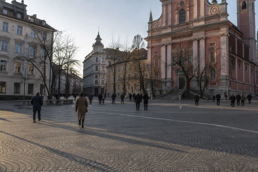Prešeren Square and the pink Franciscan church fronting the pedestrian zone
